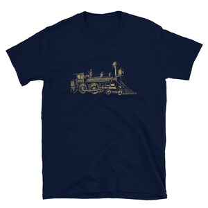 May include: A navy blue t-shirt with a vintage illustration of a steam locomotive train in gold.