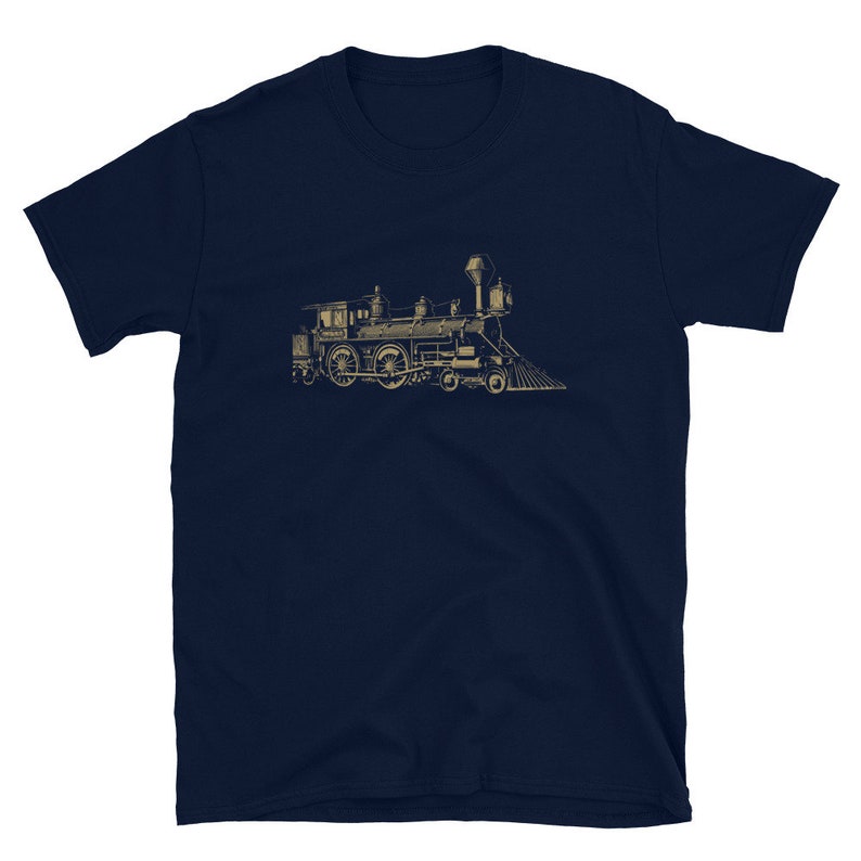 May include: A navy blue t-shirt with a vintage illustration of a steam locomotive train in gold.