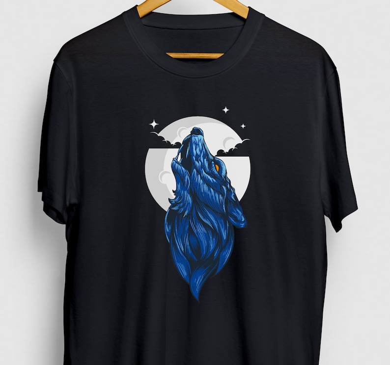May include: A black t-shirt with a blue wolf howling at the moon graphic. The moon is white with a blue sky and clouds. There are stars in the sky.