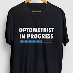 検眼医ギフト、面白い検眼医シャツ、検眼Tシャツ、検眼医シャツ、検眼医進行中パーカー/ユースシャツ/ユニセックスTシャツ