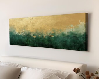 May include: Abstract canvas art featuring a textured gold and emerald green landscape. The artwork has a horizontal orientation and is mounted on a wall above a bed. Gold leaf accents add a touch of luxury.