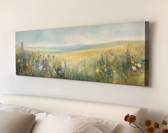 May include: A long, horizontal canvas painting depicting a field of wildflowers in shades of blue, purple, and white. The field is set against a backdrop of rolling hills and a distant blue sky.