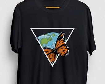 May include: Black t-shirt featuring a graphic of a butterfly flying over a globe within a white triangle.