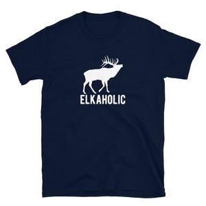 May include: A navy blue t-shirt with a white silhouette of an elk with antlers and the text "ELKAHOLIC" printed on the front.