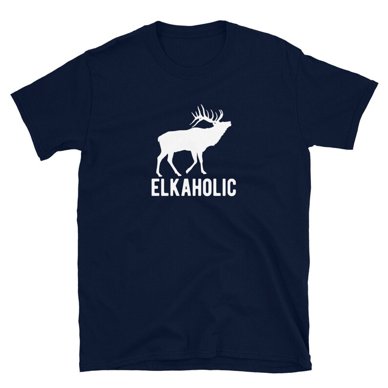 May include: A navy blue t-shirt with a white silhouette of an elk with antlers and the text "ELKAHOLIC" printed on the front.
