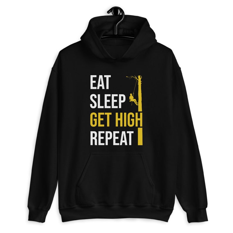 May include: Black hoodie with a white graphic that says "Eat Sleep Get High Repeat" and a silhouette of a person climbing a tree.