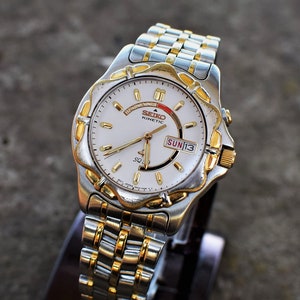 Seiko kinetic sq50 on sale