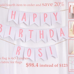 Embroidered name cake topper on pink cotton flags with strawberries on each end. Personalized topper for berry first birthday celebration.