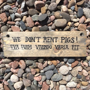 18" Lonesome Dove Sign - We Don't Rent Pigs