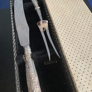 Sterling silver boxed carving knife and fork