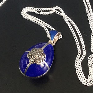Sterling silver blue enamel egg pendant with marcasite.
