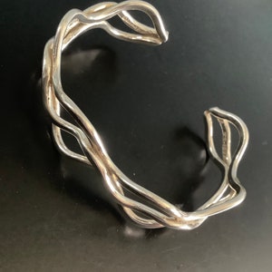 Sterling silver wavy torque bangle