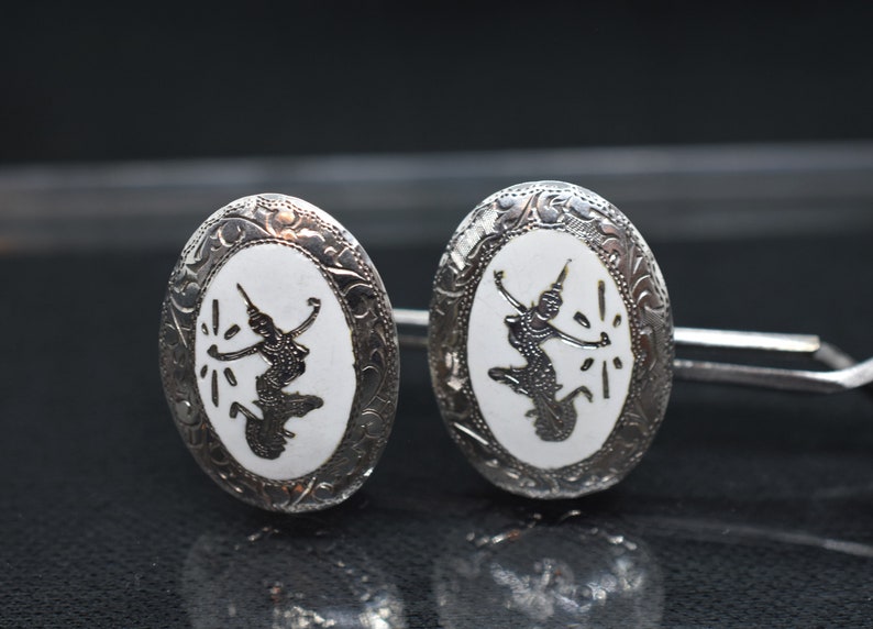 Vintage Mekkala Goddess of Lightening Siam White Enamel And Sterling Silver Clip On Earrings