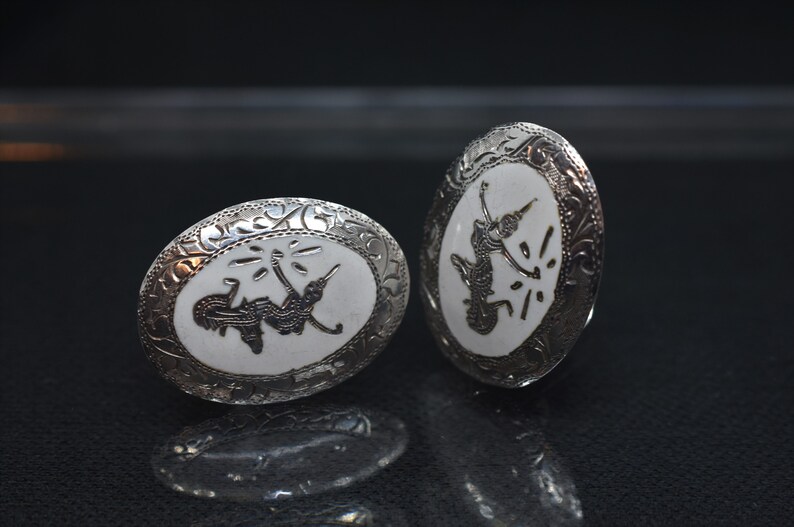 Vintage Mekkala Goddess of Lightening Siam White Enamel And Sterling Silver Clip On Earrings