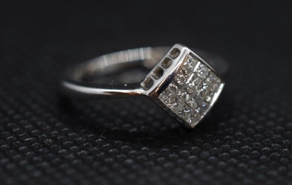 invisible princess cut diamond ring