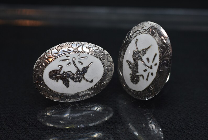 Vintage Mekkala Goddess of Lightening Siam White Enamel And Sterling Silver Clip On Earrings