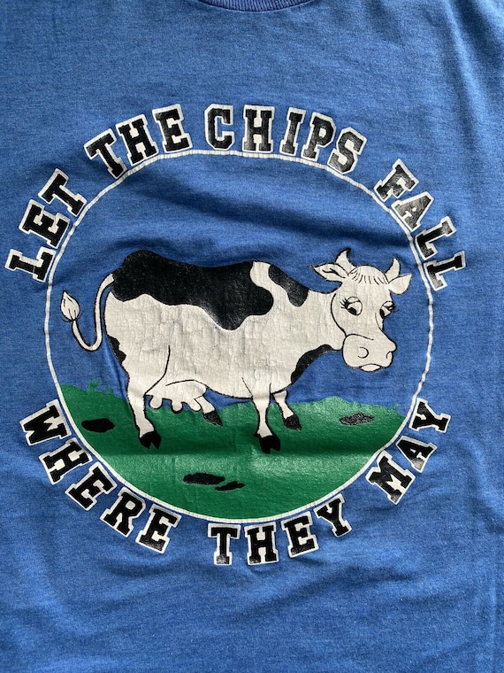 Vtg 70s 80s Funny Cow T-shirt Let the Chips Fall Where They