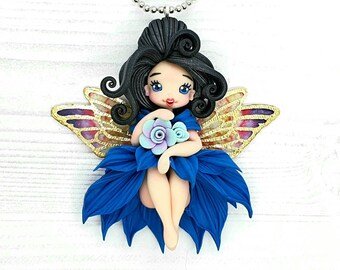 Necklace with polymer clay fairy