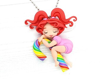 Rainbow candy cane. Necklace with Fimo doll.