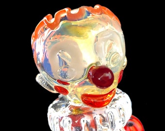 Hand blown glass clown pipe.