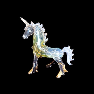 Hand blown glass show unicorn pipe.