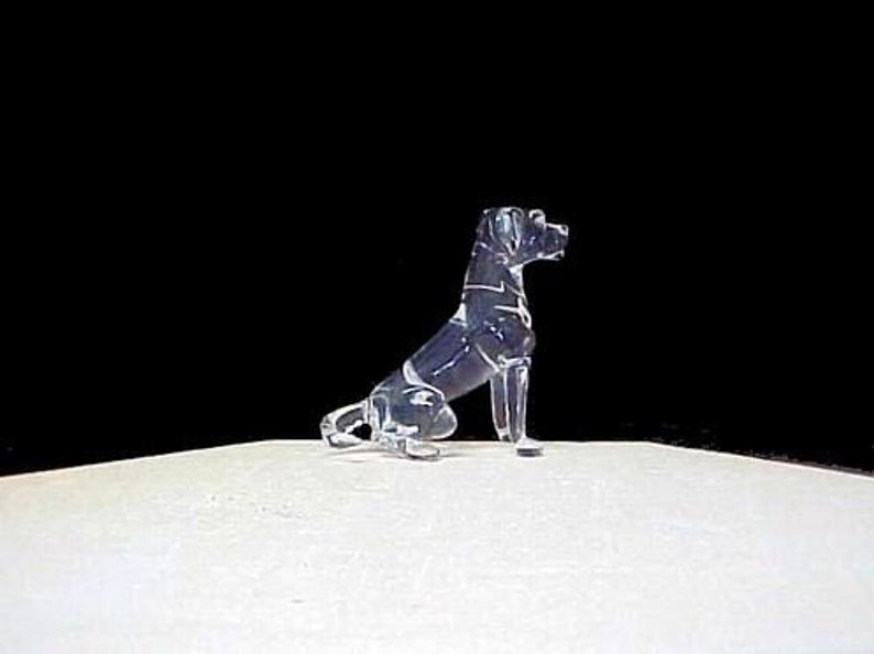Hand blown glass sitting rottweiler figurine collectible.