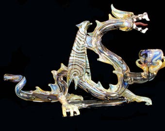 Hand blown glass flying Dragon pipe.