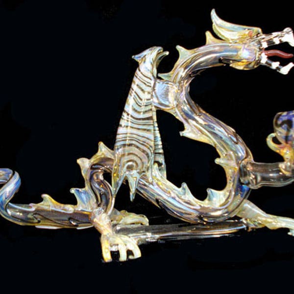 Hand blown glass flying Dragon pipe.