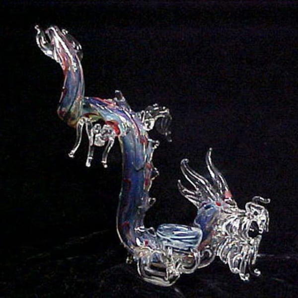 Hand blown glass dragon pipe with lots of details.
