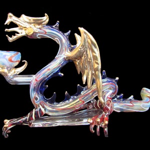 Hand blown glass mega wing snake dragon pipe.