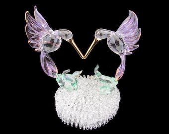 Hand blown glass flying hummingbirds wedding cake top.