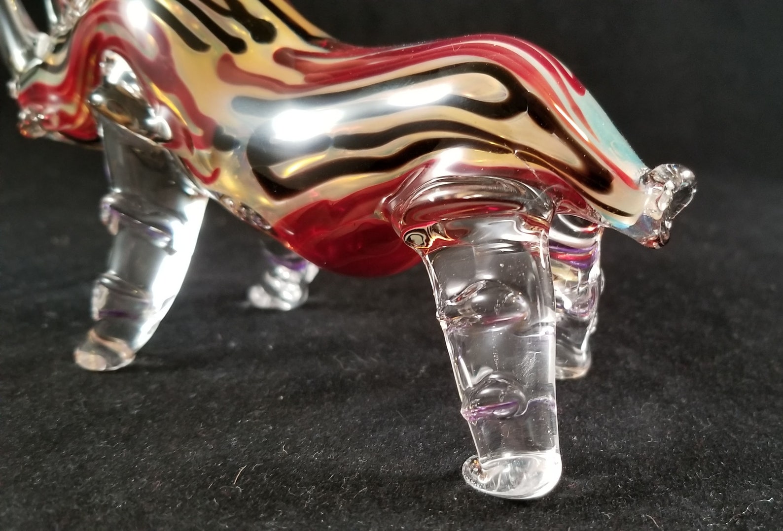 Hand blown glass rhinoceros pipe. Etsy