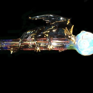 Hand blown glass dragon pipe.