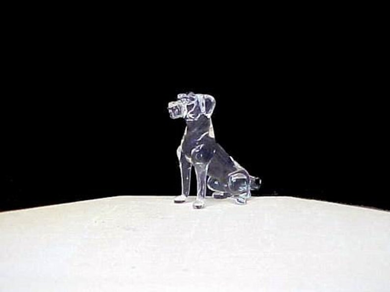Hand blown glass sitting rottweiler figurine collectible.