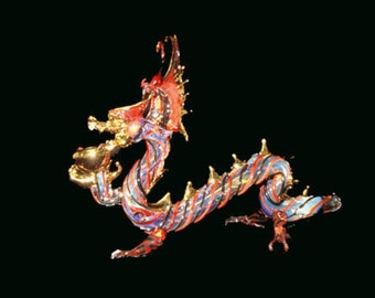 Hand blown glass queen dragon pipe.