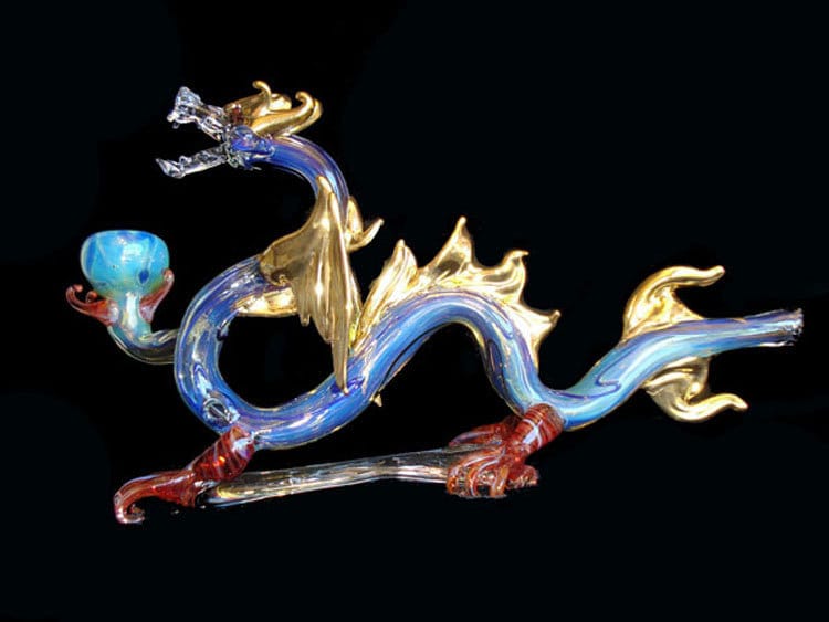Hand blown glass dragon pipe with wings.