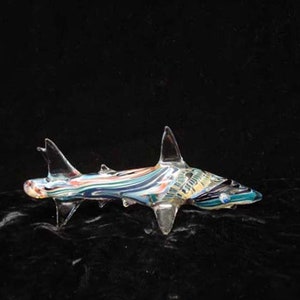 Hand blown glass shark pipe.