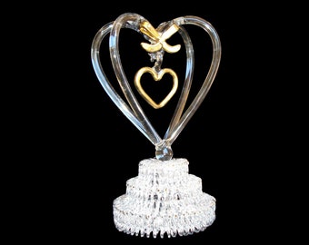 Customizable blown glass double heart wedding cake topper.