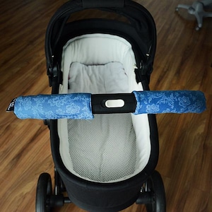 Stroller handlebar grip covers