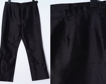 Pantalon en soie taille haute de l'an 2000. élégant pantalon large d'été noir vintage en soie des années 2000.