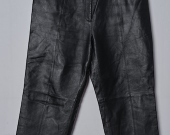 Y2K leather jorts , culotte high-waisted pants .Vintage 3/4 black cullote leather pants with wide leg  from the early 2000s. size EU 42