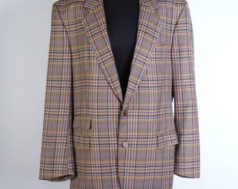 May include: A brown, beige, and blue plaid blazer with a single button closure.