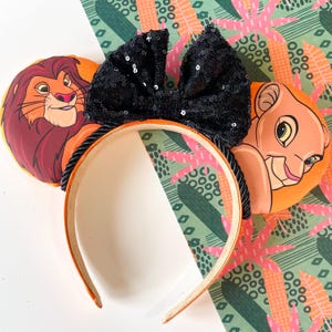 Hand made Lion king inspired Simba and Nala mouse ears headband