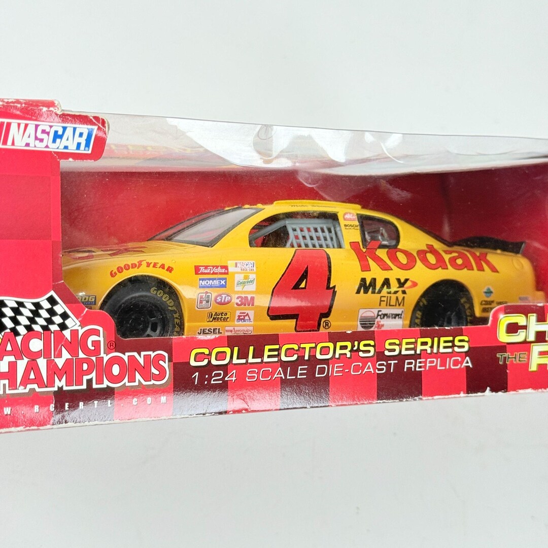 2002 Racing Champions Mike Skinner #4 Kodak Max Chase the Race 1