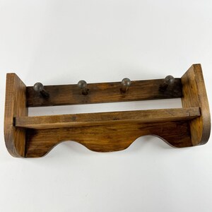 Vintage Wood Shelf With Pegs - Etsy Vintage Rustic Wooden Carriage Stagecoach Wall Shelf with Hanging Pegs Brown main image 0
