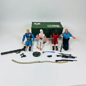Random lot of 4 G.I. Joe Action Figure Bundle With Weapons & Storage Box