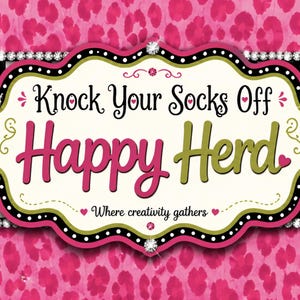 May include: A rectangular sign featuring a pink leopard print background with a central scalloped label. The label displays the text Knock Your Socks Off Happy Herd and Where creativity gathers, accented by rhinestones and a black and white checkerboard border.