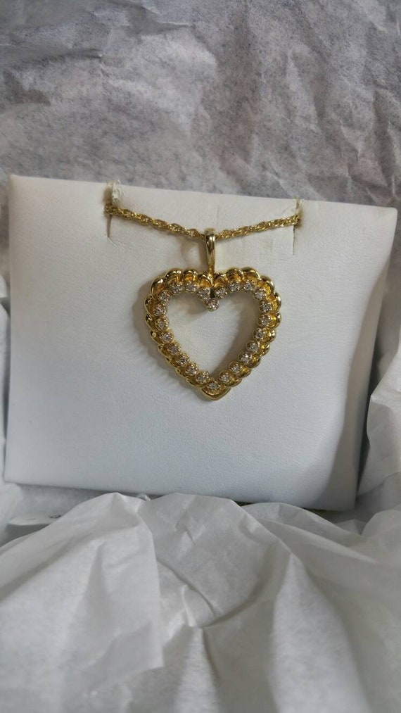 Estate Jewelry diamond heart necklace.