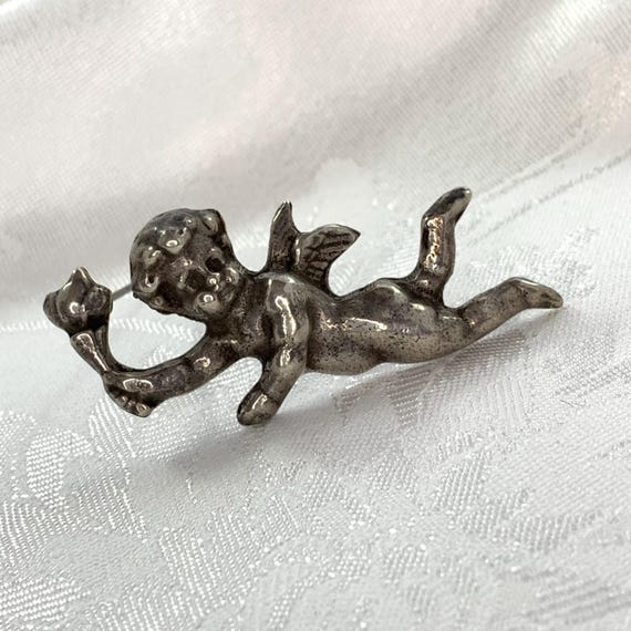 Vintage Cupid Brooch: Sterling Silver Cherub with Torch