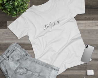 T-shirt met Be Still-script typografie